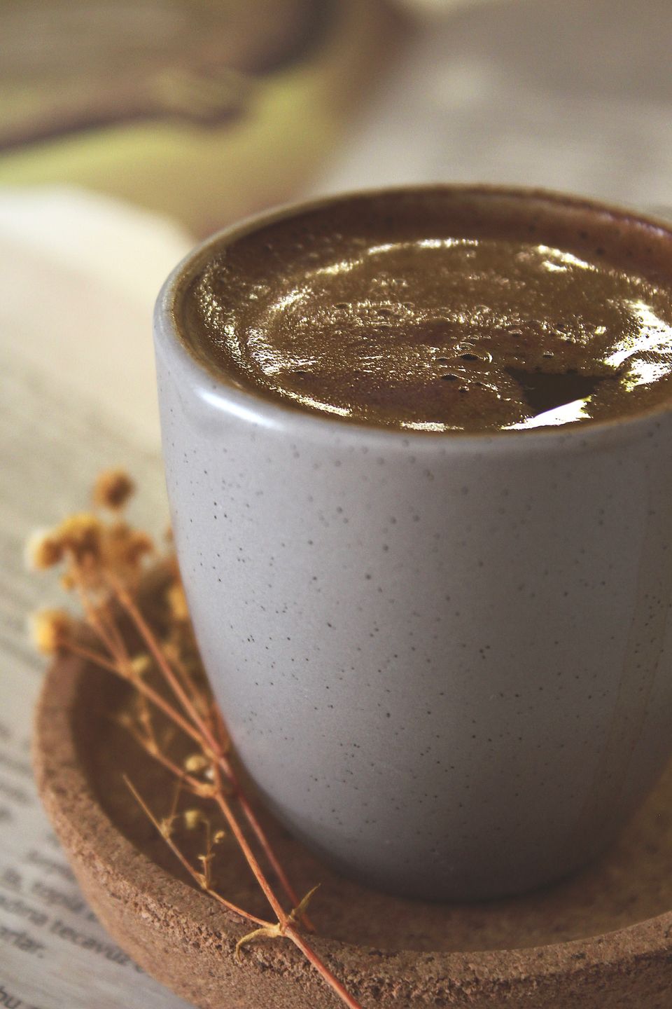 Illustrative photo of hot chocolate in a pale gray ceramic mug.