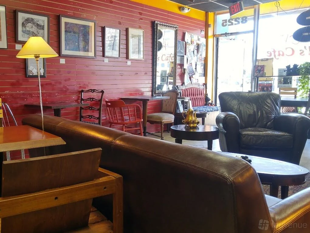 Seating by the front window, with 8225 visible over the entrance.